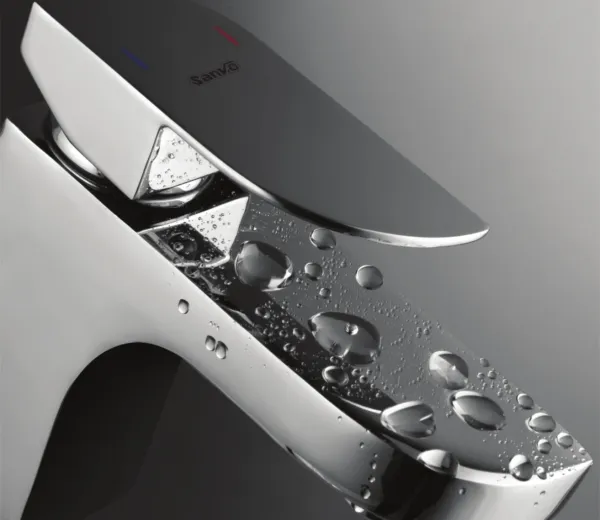 Chrome single lever basin mixer with water droplets beaded on its angled handle, AV-1723
